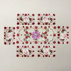 A set of six rectangular embroidered patches arranged in a cross-like layout on a light beige textured fabric background. The central patch is larger and features a purple floral motif, while the surrounding five patches are smaller and decorated with red and pink floral patterns, pink striped hearts, and green leaves.